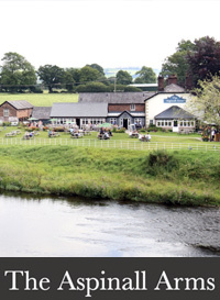 The Aspinall Arms is found right in the heart of the Ribble Valley, and sits on the banks of the river overlooking the medieval All Hallows church and the 14th century Great Mitton Hall on the raised bluff opposite. With terraced and landscaped gardens outside, and flagged floors and open fires inside, it's just the pub for walkers, cyclists and anglers to mingle and dine alongside the friendly locals.